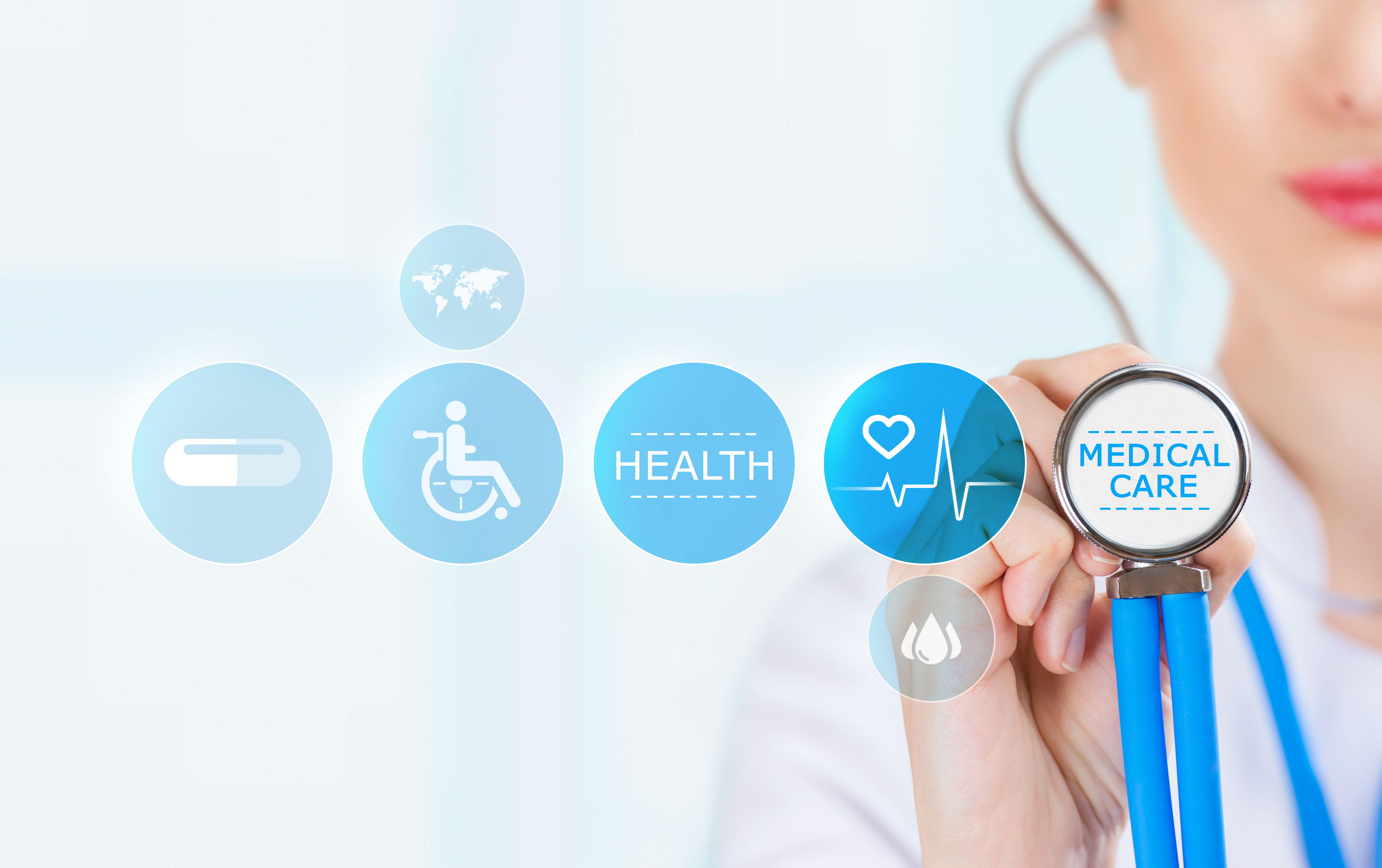 Medicine doctor hand holding stethoscope and working with modern medical icons